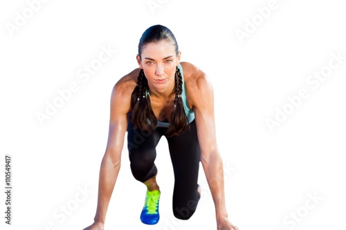 Sporty woman in the starting block