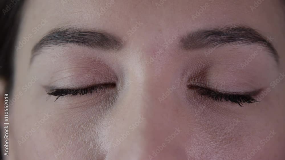 Close up on the closed eyes of a beautiful young woman Close up on the closed eyes of a beautiful young woman