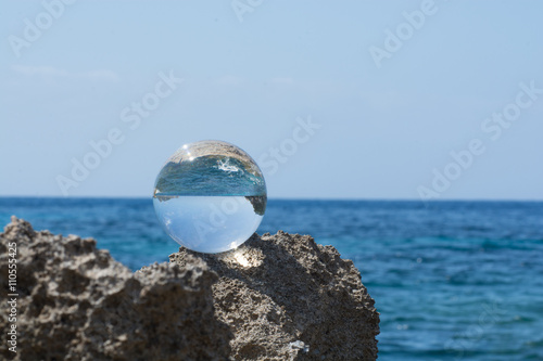 Glass ball at Mediterranean Sea