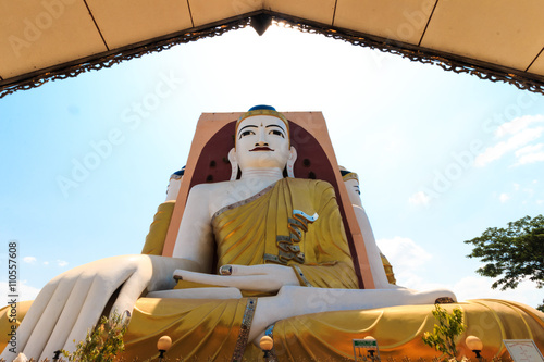 Four direction buddha statue temple at Kyaikpun Buddha, Bago, Myanmar. photo