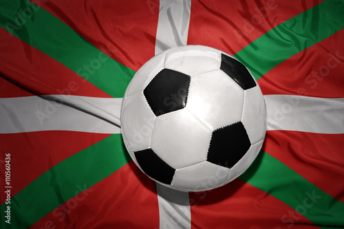 black and white football ball on the national flag of basque country