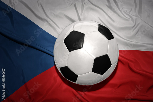 black and white football ball on the national flag of czech republic