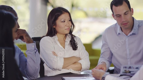 Wallpaper Mural  Attractive confident business group negotiating a deal in office meeting Torontodigital.ca