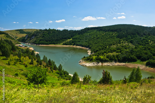 Camping area at river Uvac gorge at sunny summer morning, southwest Serbia © banepetkovic