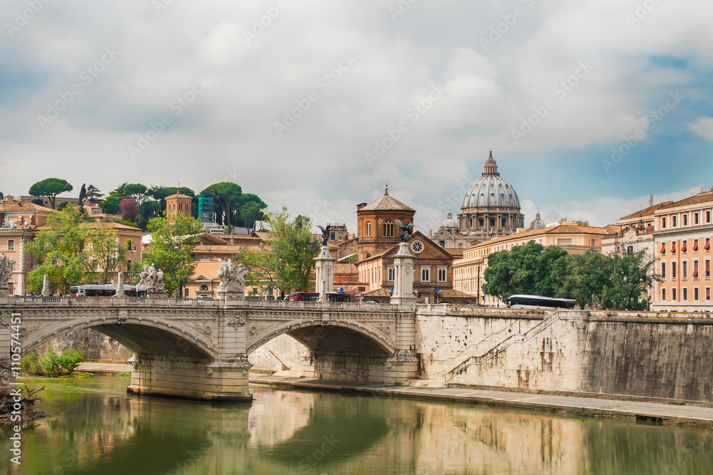 Beautiful view at Tiber river and Vatican city behind in Rome, Italy.