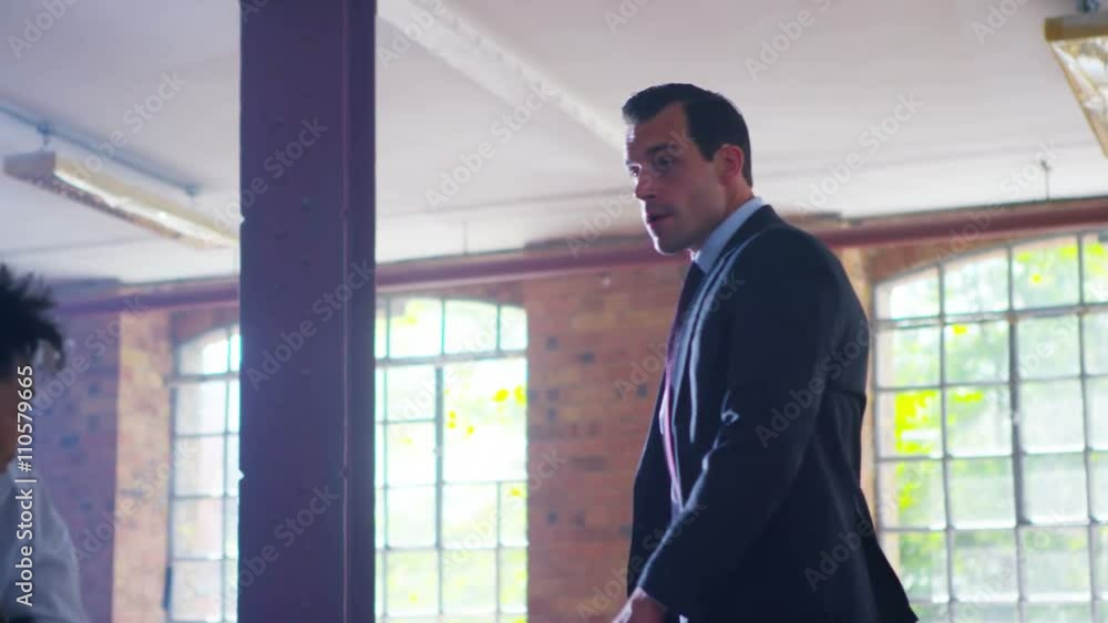 Handsome businessman or special agent character outnumbered in a fight Handsome businessman or special agent character outnumbered in a fight