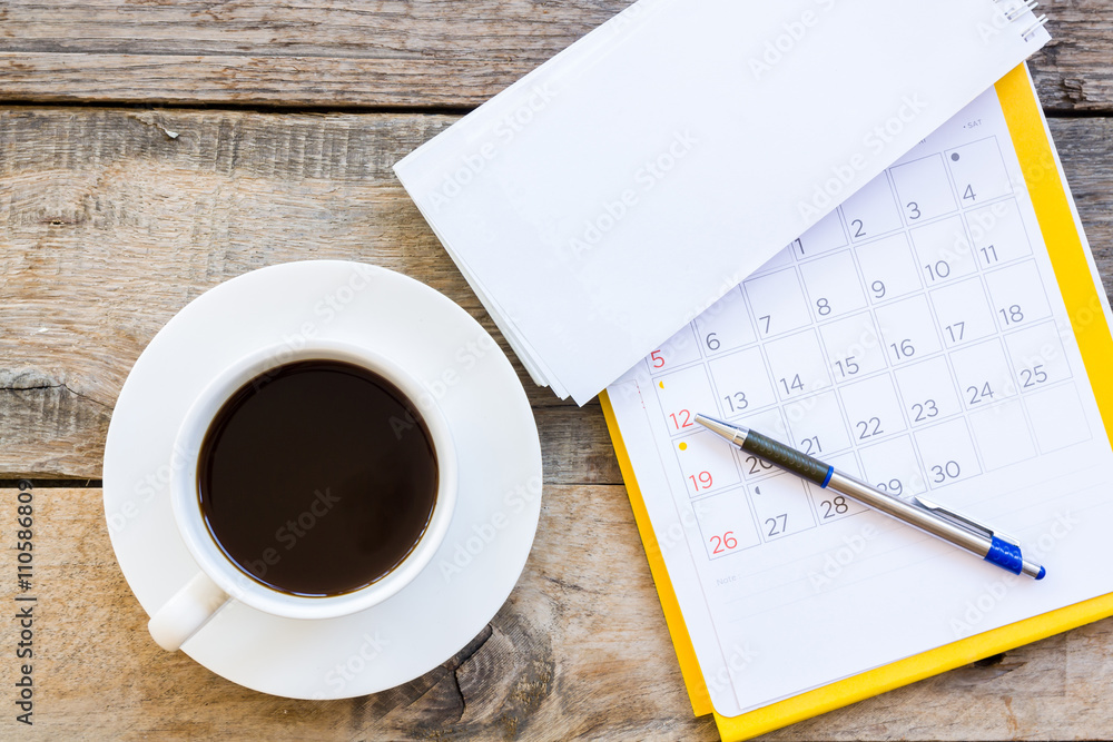 cup of coffee with paper note on wood table background cup of coffee with paper note on wood table background