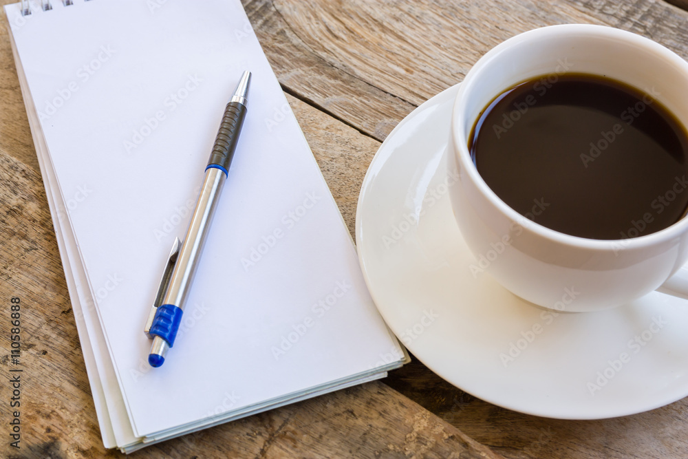 cup of coffee with paper note on wood table background cup of coffee with paper note on wood table background