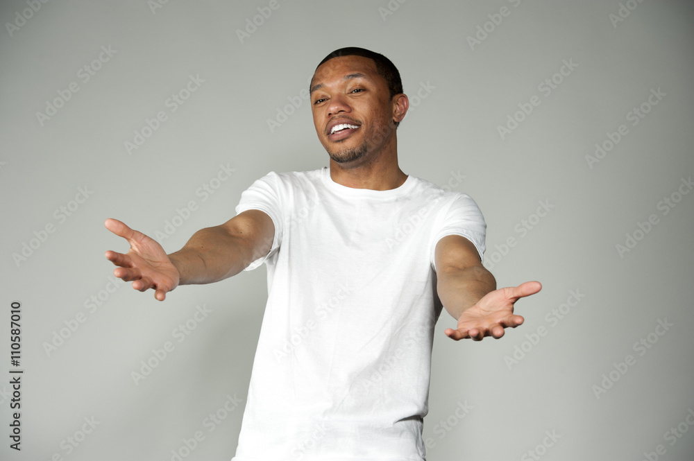 Trendy Happy and Fun Black Male Wearing A White Top Trendy Happy and Fun Black Male Wearing A White Top