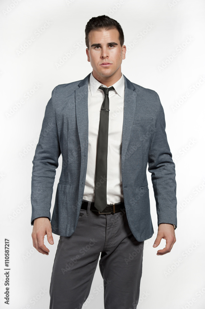 Fototapeta premium Fit White Lifestyle Male Model In Fashionable Suit