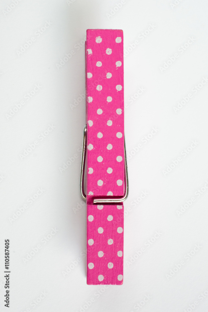 Fototapeta premium Pink Clothes Pin with Fun Patterns Top View