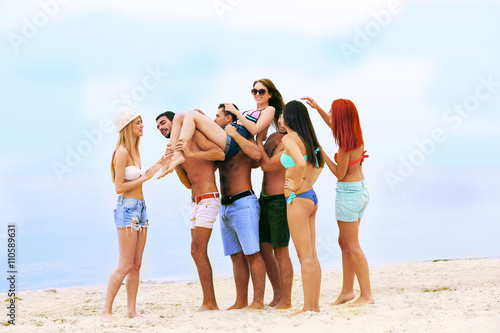 Beautiful young people havi...
