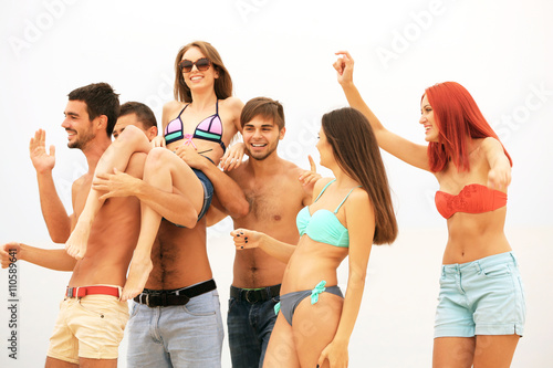 Beautiful young people havi...