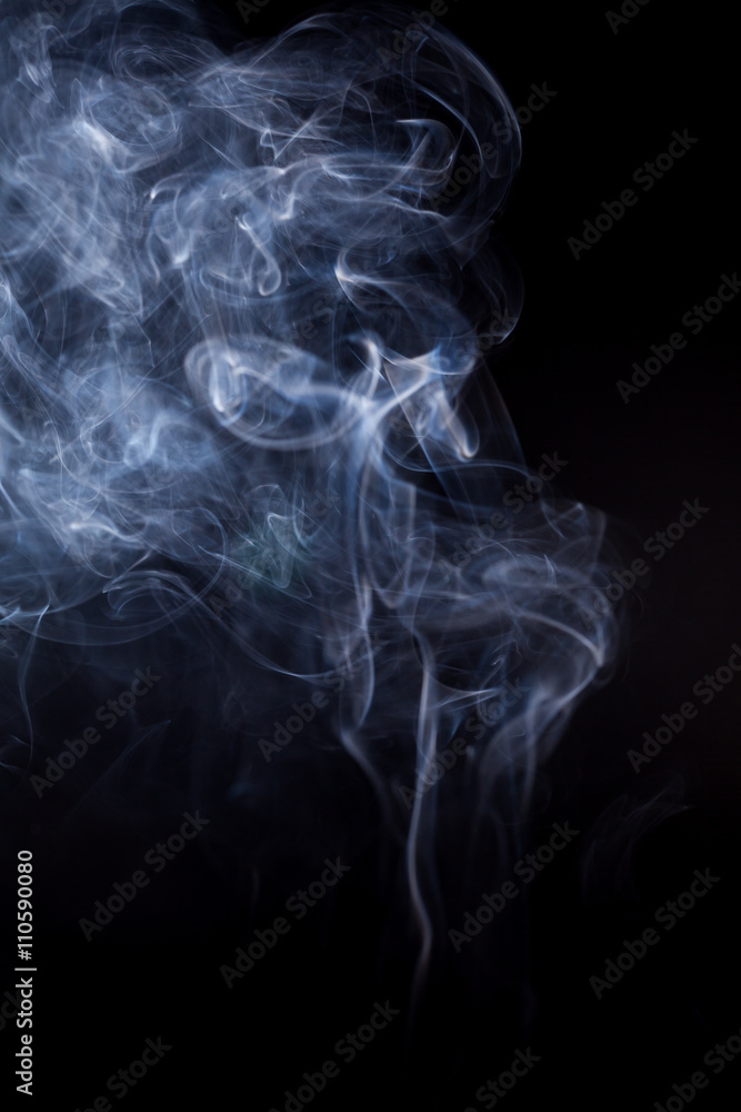 Obraz premium White smoke on a black background.