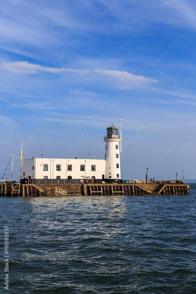 Scarborough lighthouse viewed from the harbour. In Scarborough, England. On 5th May 2016.