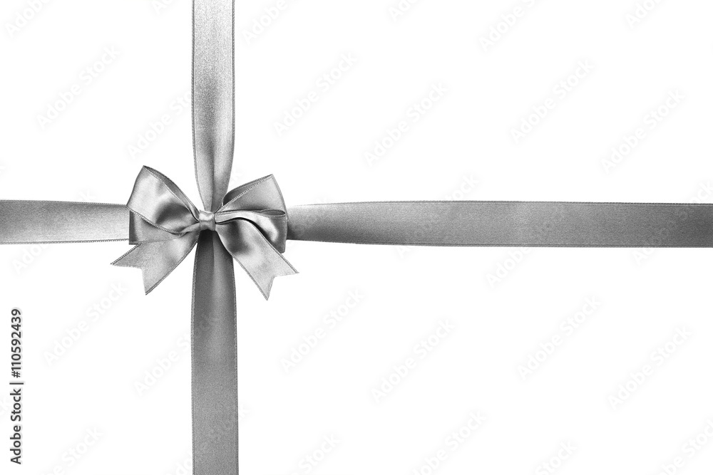 Silver silk ribbon with beautiful bow isolated on white background Silver silk ribbon with beautiful bow isolated on white background