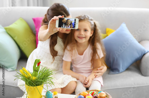 Mother and daughter making ...