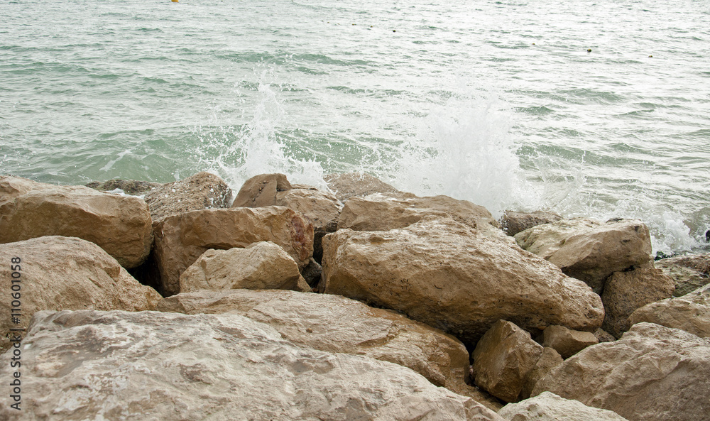 Splashing water on the rocks. Splashing water on the rocks.