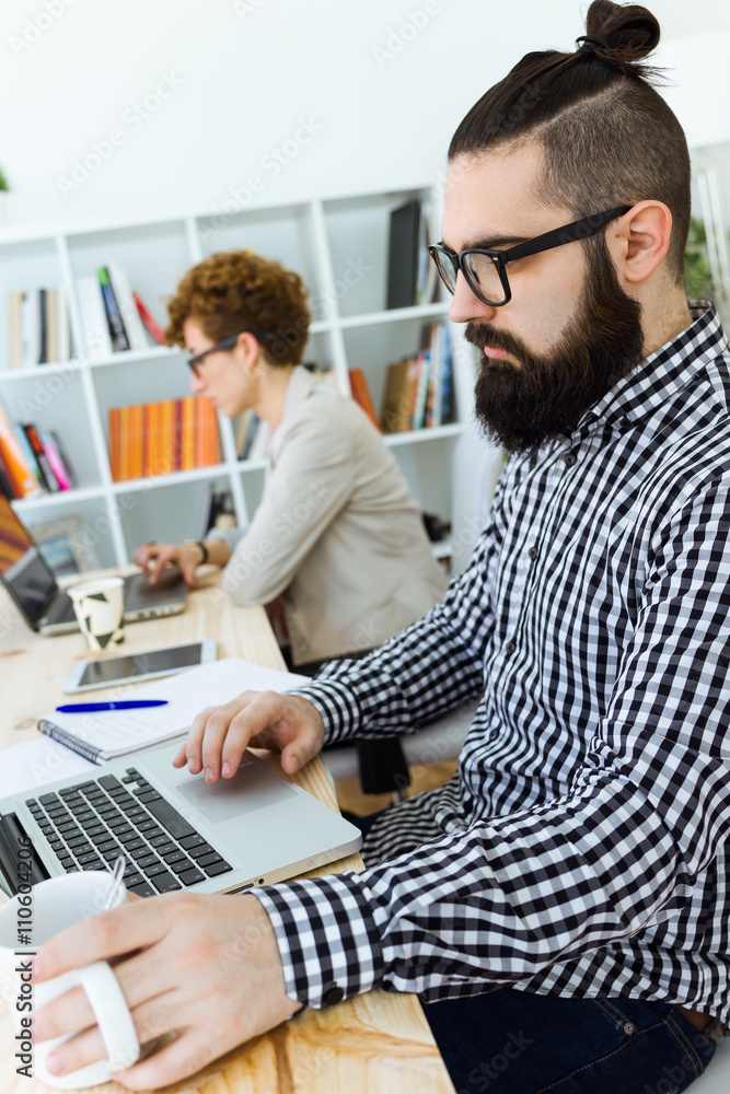 Business people working in the office with laptop. Business people working in the office with laptop.