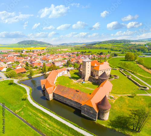 Aerial view to Svihov castle. Gothic architecture on river island. Beautiful landmark in national park Sumava, Czech Republic, Europe.  photo