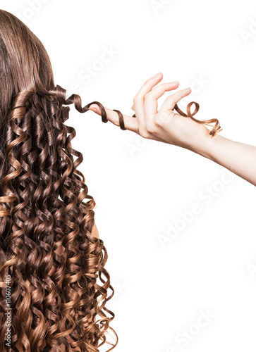 Принти на полотні Hairstyle of curls, curl hairdresser hand holding isolated on white