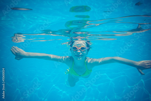 Underwater portrait of child