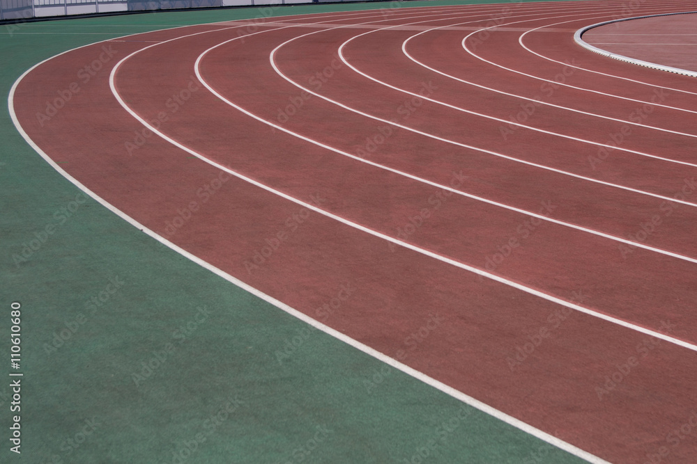 The running ways at the stadium with artificial coating of rubber 