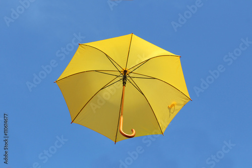 Yellow Umbrella in a Sky On Bright Day
