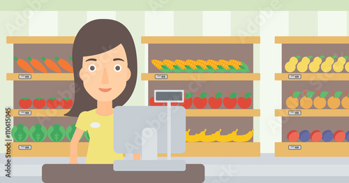 Saleslady standing at checkout.