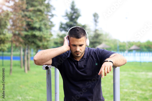 man tired listening music