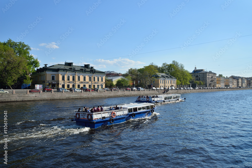 Naklejka premium River Fontanka and pleasure boat white