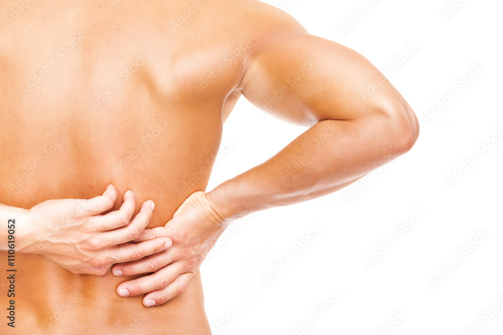 Rear view of a young muscular man holding his back in pain, isol Rear view of a young muscular man holding his back in pain, isol