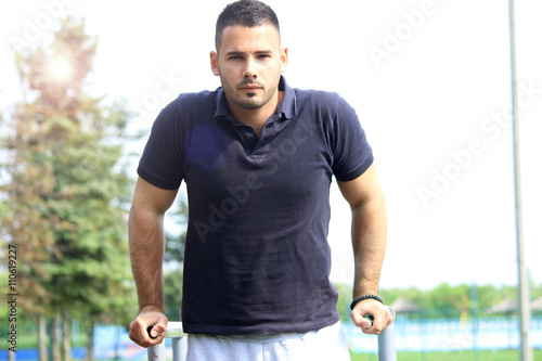 young man doing workout photo