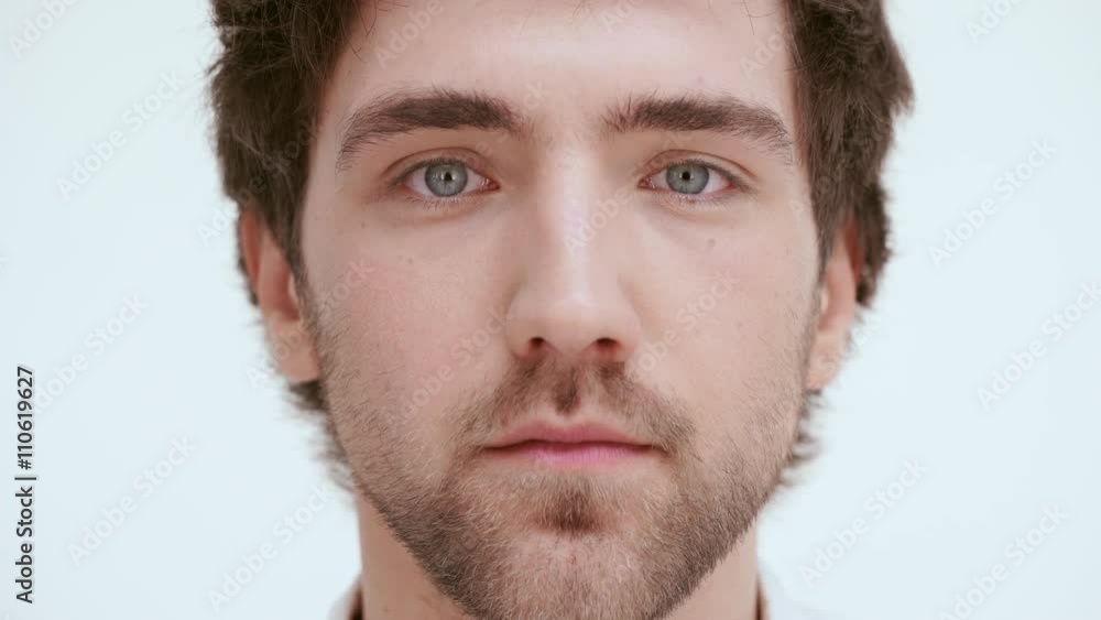 Handsome man watching at you. Close up Handsome man watching at you. Close up