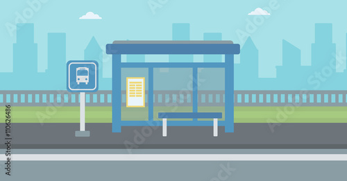 Background of bus stop with skyscrapers behind.