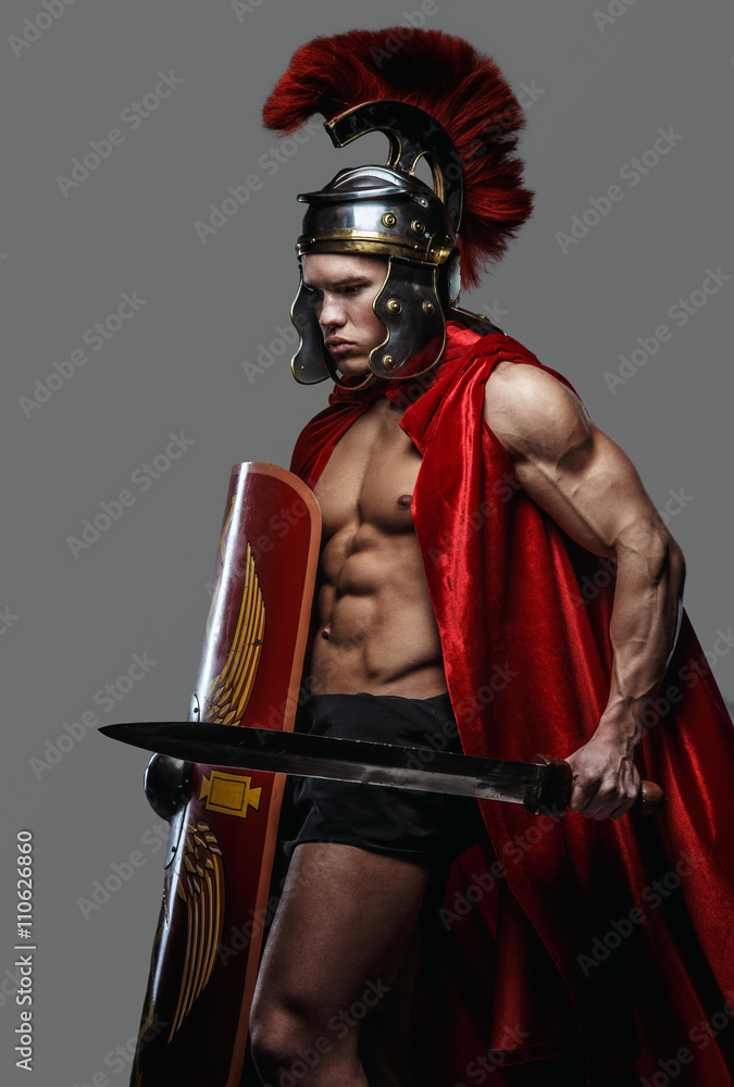 A man in Roman soldier costume. A man in Roman soldier costume.