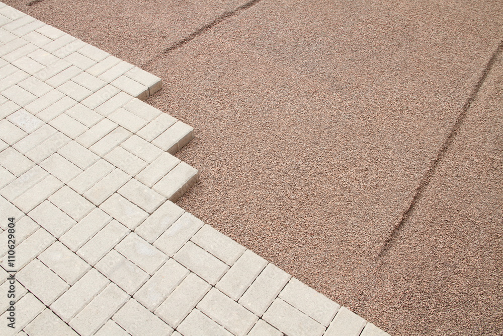 Rechteckpflaster verlegen StockFoto Adobe Stock