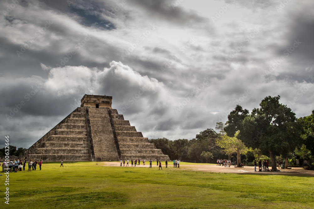Chichen Itza, Mexico - January 12th 2014 - Local and tourists enjoying a cloudy morning in Chichen Itza near by Cancun in Mexico Chichen Itza, Mexico - January 12th 2014 - Local and tourists enjoying a cloudy morning in Chichen Itza near by Cancun in Mexico