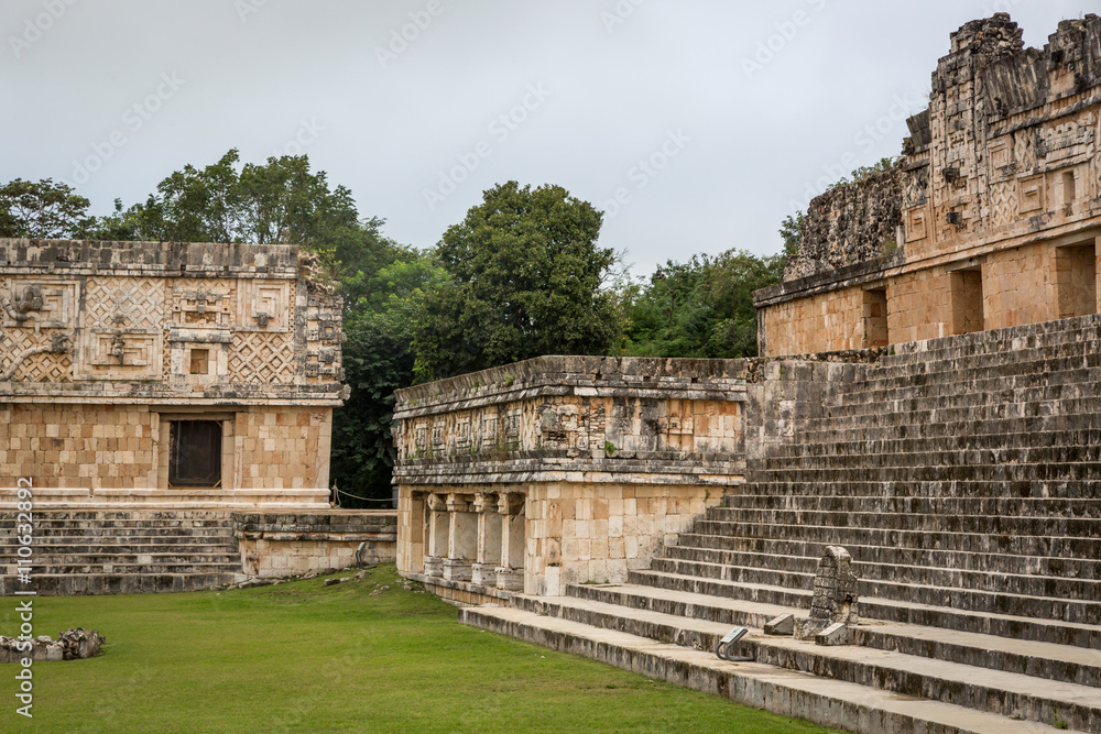 Uxmal, Mexico - January 12th 2014 Tourists enjoying a cloudy day at the Uxmal Ruins in Mexico.