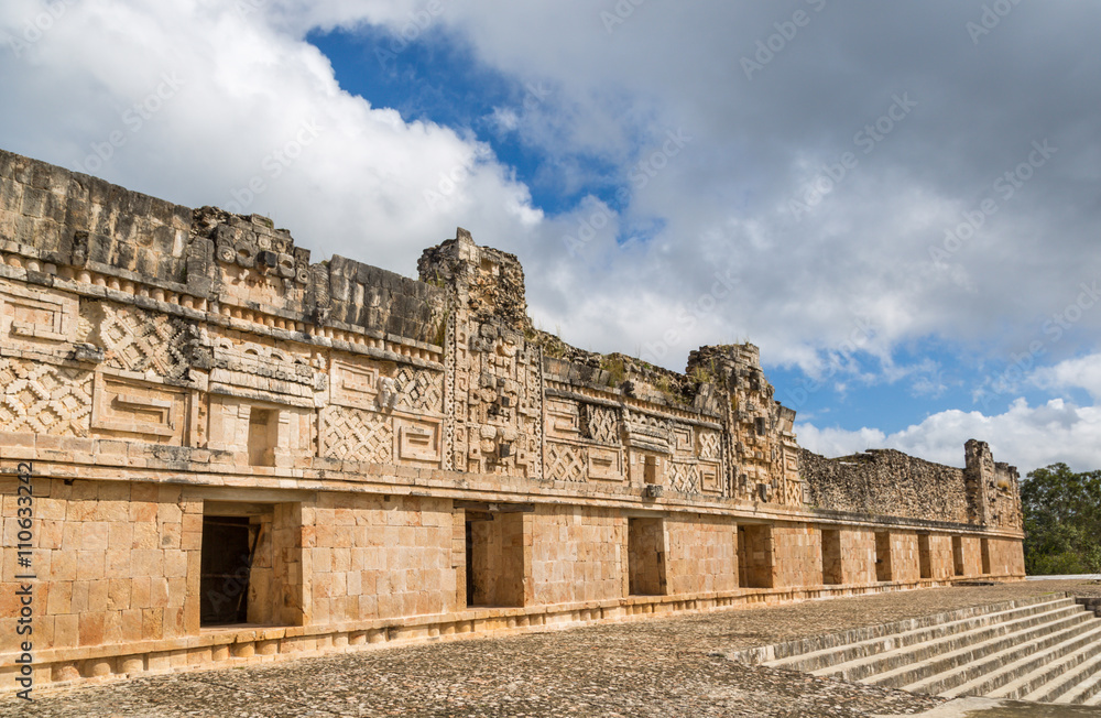 Uxmal, Mexico - January 12th 2014 Tourists enjoying a cloudy day at the Uxmal Ruins in Mexico.