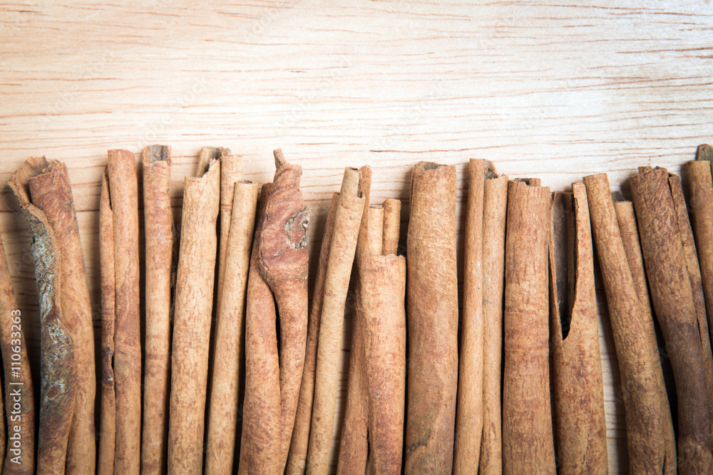 close up cinnamon stick arrange as a row as a background close up cinnamon stick arrange as a row as a background