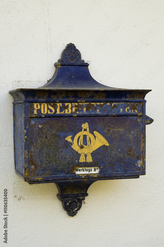 old blue mailbox with post horn