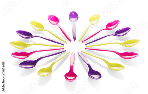 Colorful plastic spoons isolated 