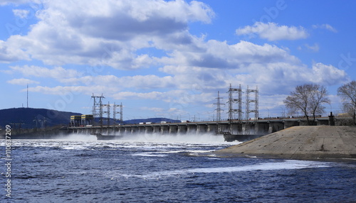 Reset water on the river at the dam in the spring, at the top of the bridge