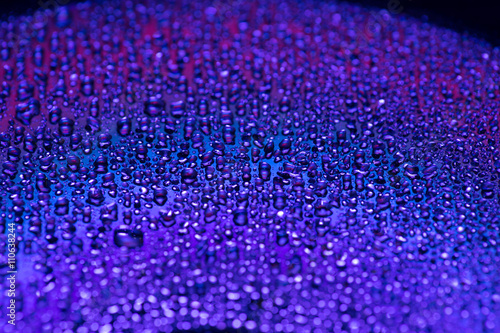 Water drop on Disc Purple LIght
