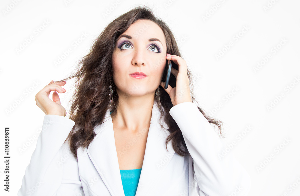 Beautiful lady in white jacket with mobile ephone isolated on white background Beautiful lady in white jacket with mobile ephone isolated on white background