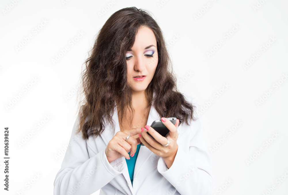 Beautiful lady in white jacket with mobile ephone isolated on white background Beautiful lady in white jacket with mobile ephone isolated on white background