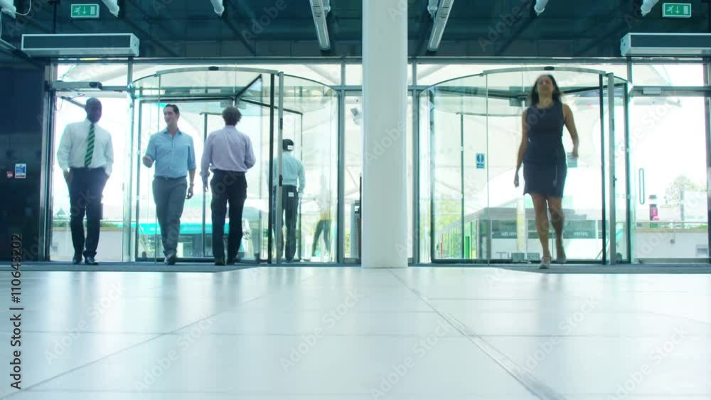 Time lapse of business team in lobby area of modern office building