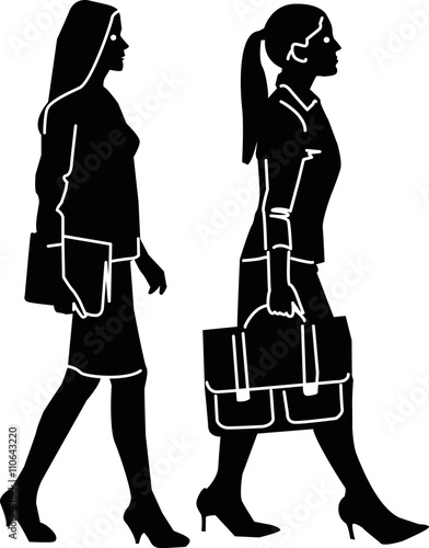 two businesswomen walking in a row