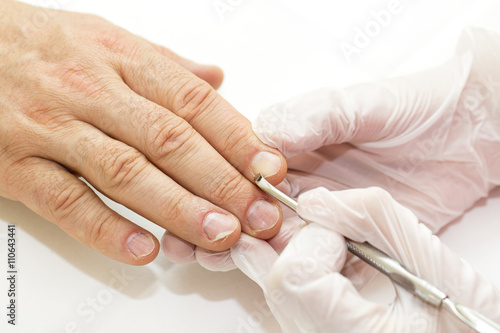 the process of the male manicure in a beauty salon